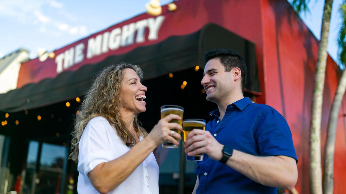 Kim Murdock and her son, Patrick Murdock Jr., work from their bar The Mighty in Miami’s Silver Bluff neighborhood. The Murdocks bought the neighborhood bar that has become a popular staple with locals for years.