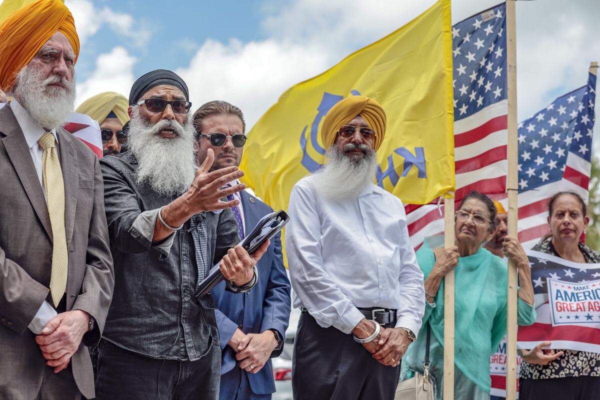 Community gathering of the Sikh community in support of Harjinder Singh, a truck driver who is accused of manslaughter and vehicular homicide. They are also in support of the victims who were killed in the crash on the Florida Turnpike in St. Lucie County. Leading the group is Gurpatwant Singh Pannun, the legal advisor for Sikhs for Justice gestures as he speaks to reporters on Thursday, August 28, 2025, at the St. Lucie County Jail in Fort Pierce, Florida.