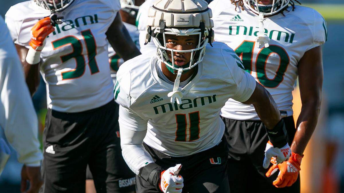 Miami Hurricanes linebacker Corey Flagg, Jr. (11) runs drills at the University of Miami’s Greentree Practice Fields on Monday, Aug. 15, 2022, in Coral Gables, Fla.