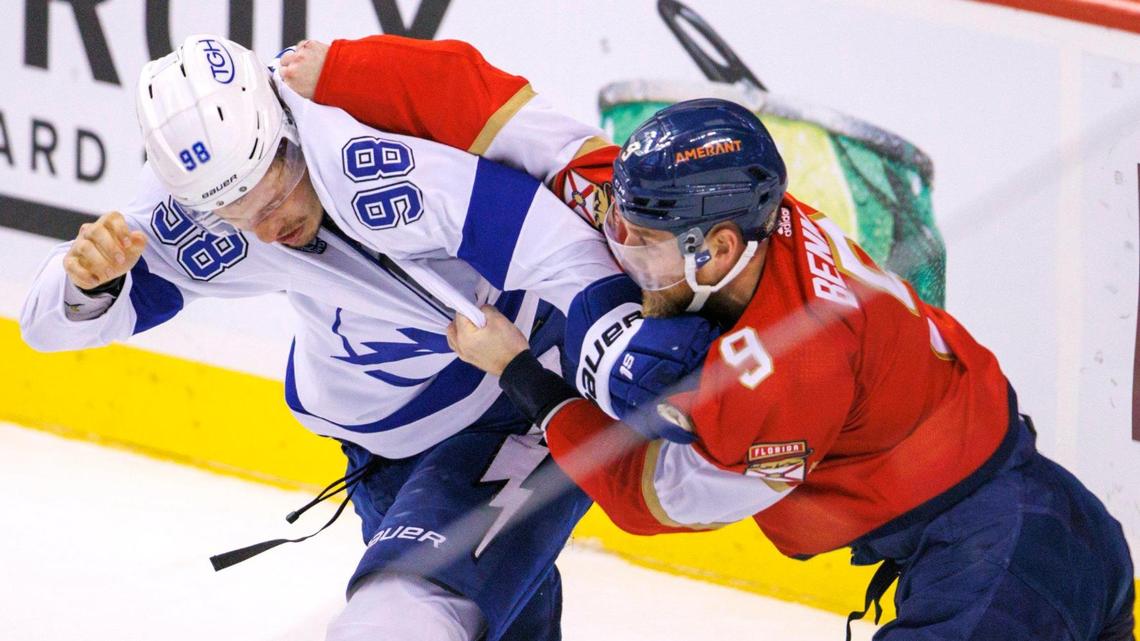 Panthers center Sam Bennett (9) fights with Lightning defenseman Mikhail Sergachev during the second period of Florida’s loss at FLA Live Arena on Sunday night.