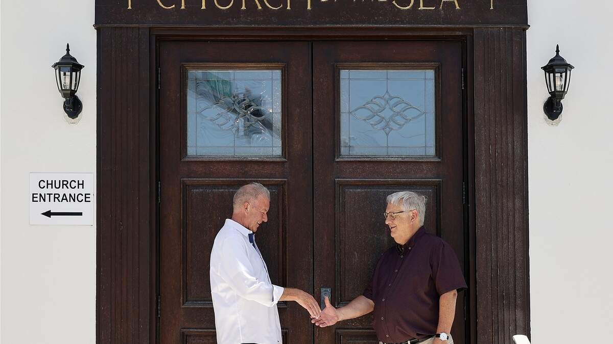 Church By The Sea treasurer Harry Rozelle, left, and senior pastor Brian Checchio, came together to raise funds for the church to build a living seawall, which will help combat the pollution in the waterway by the church.