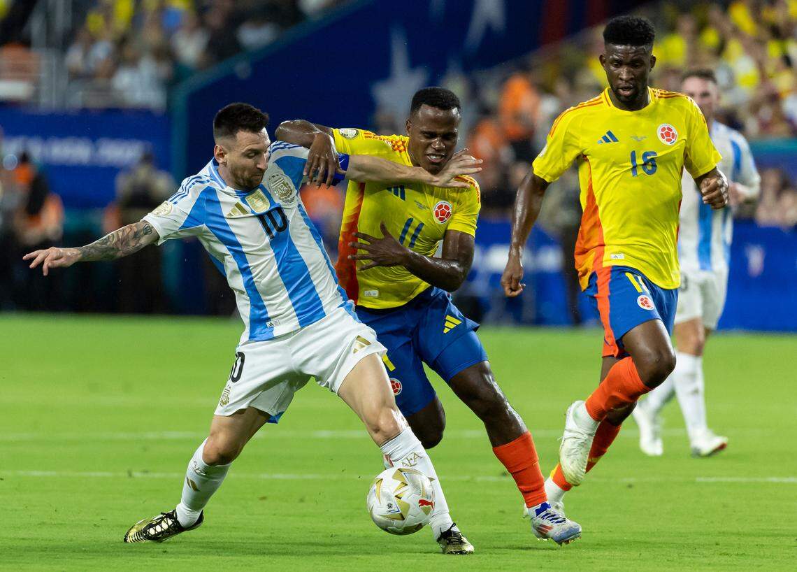 Argentina forward Lionel Messi (10) and Colombia midfielder Jhon Arias (11) compete for the ball in the first half of their Copa America 2024 Final soccer match at Hard Rock Stadium on Sunday, July 14, 2024, in Miami Gardens, Fla.