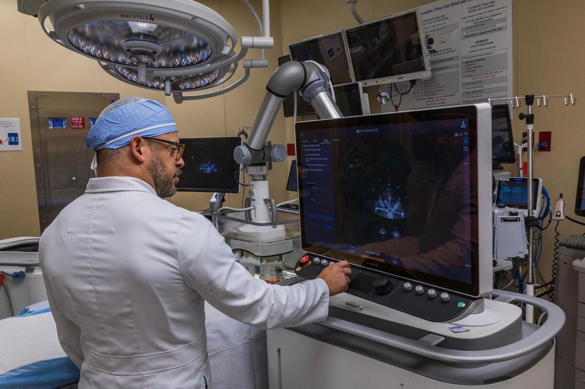 Dr. Omar Llaguna, specialist in surgical oncology, programs a HistoSonics medical device for targeting a medium that mimics a liver tumor in a human body to demonstrate how a histotripsy procedure works, during a demonstration at the Memorial Hospital West, in Pembroke Pines, on Thursday June 12, 2025.