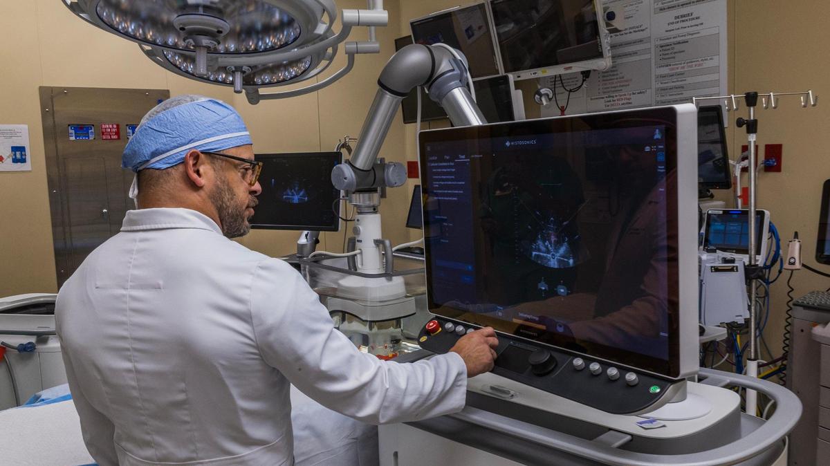 Dr. Omar Llaguna, specialist in surgical oncology, programs a HistoSonics medical device for targeting a medium that mimics a liver tumor in a human body to demonstrate how a histotripsy procedure works, during a demonstration at the Memorial Hospital West, in Pembroke Pines, on Thursday June 12, 2025.