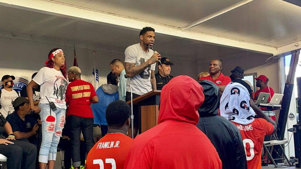 The half-mile “Stop the Silence” Peace March, which ended at Athalie Range Park in Little Haiti, included several members of the University of Miami Hurricanes and Miami Heat player Udonis Haslem, on June 16, 2021.
