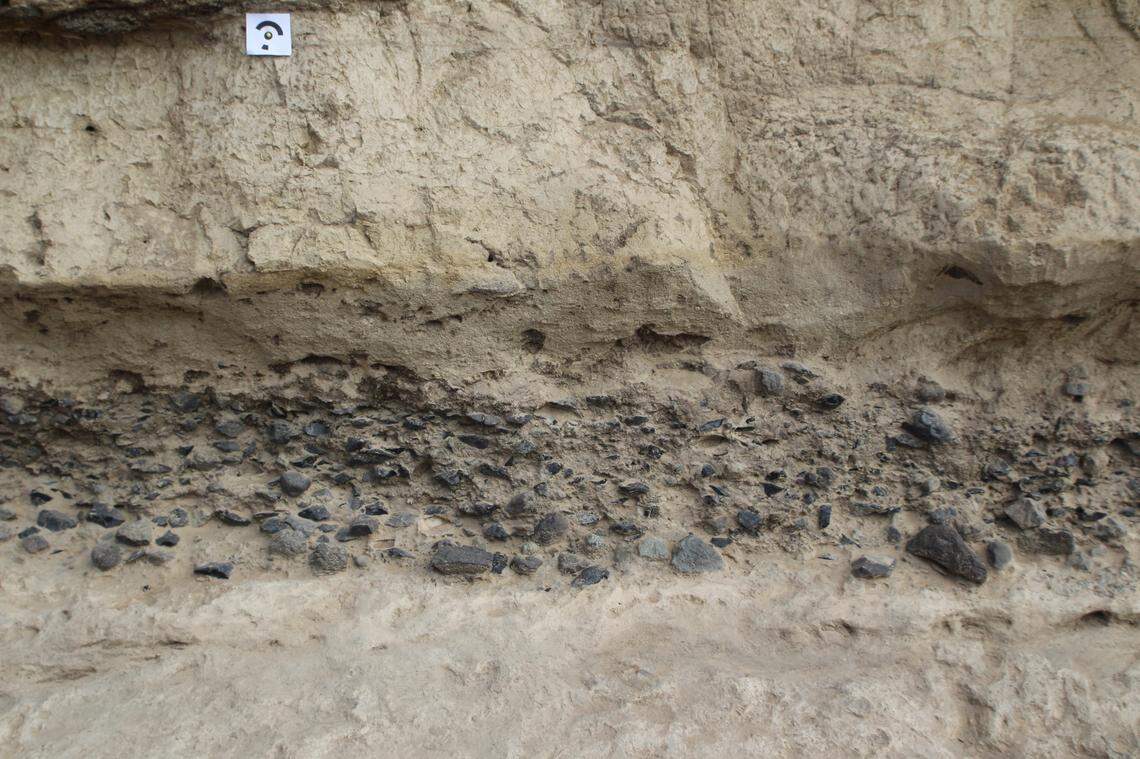 The rock layer where the “workshop” and tools were found.