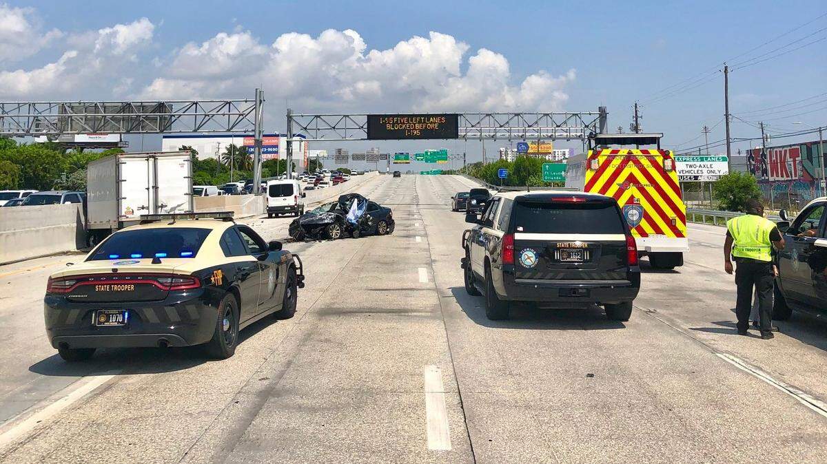 The Florida Highway Patrol is investigating after a car slammed into a stopped box truck Sept. 10, 2021, on Interstate 95 near State Road 836. Northbound lanes were closed.