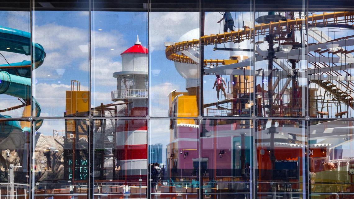 The reflection of Sportplex Adventure Trail on the large window on the MSC World America at PortMiami on Wednesday, April 9, 2025.