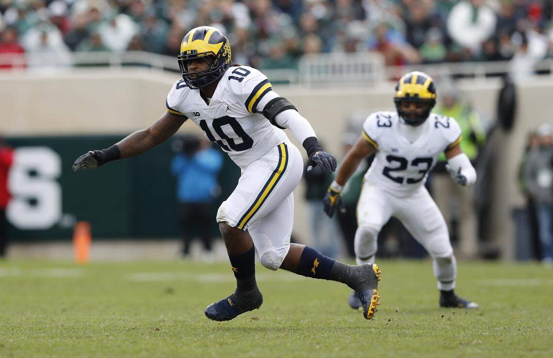 Michigan linebacker Devin Bush follows the play during the first half of an NCAA college football game against Michigan State , Saturday, Oct. 20, 2018, in East Lansing, Mich.