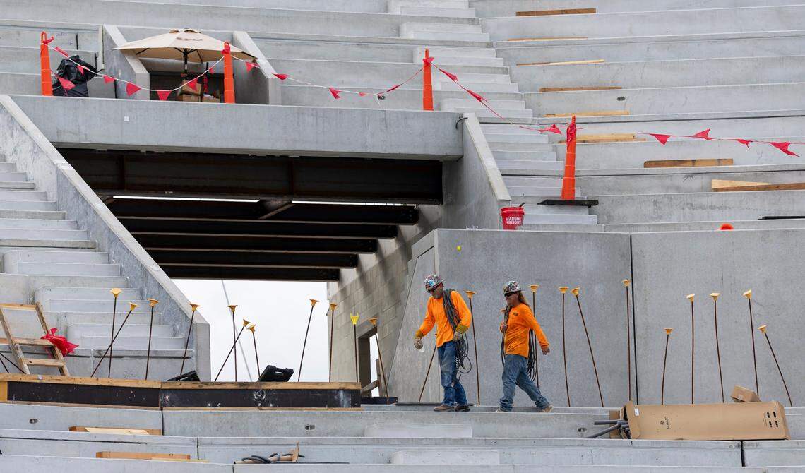 Crew members make their way through the site as construction progresses at Miami Freedom Park on Tuesday, June 24, 2025, in Miami, Fla.