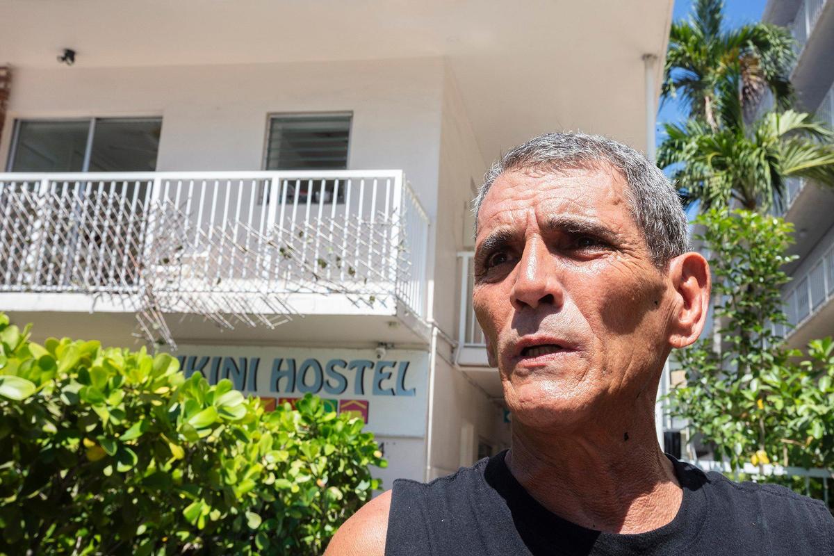 Jorge Bellon, a resident of Bikini Hostel, stands outside the Miami Beach building on Monday, June 9, 2025. The hostel, which currently shelters people experiencing homelessness through the Miami-Dade Homeless Trust, is set to be sold and demolished by a local developer, leaving residents uncertain about their future.