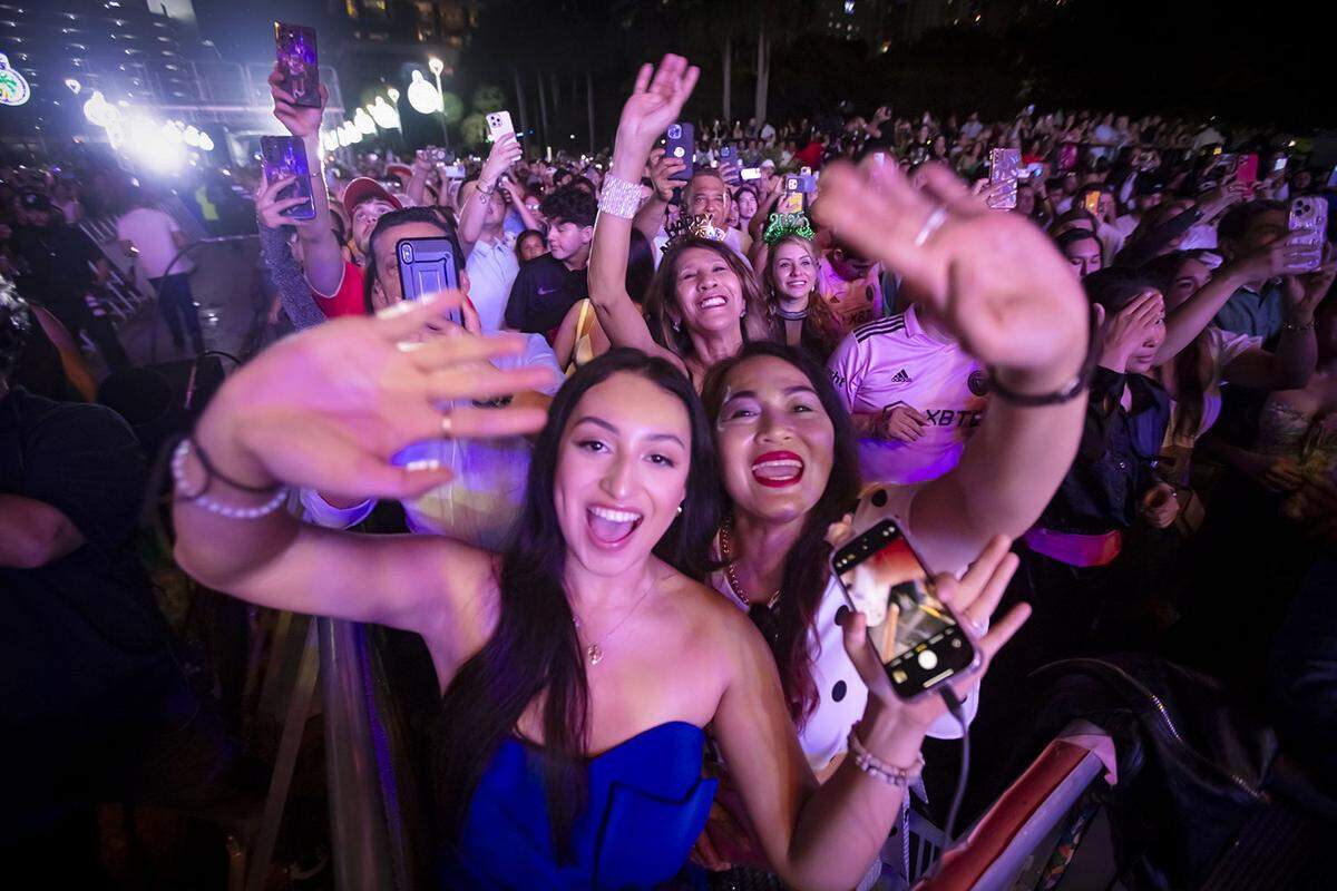 Chole Ortuño , left. and Genevieve Hume, right, celebrate the coming of 2025.