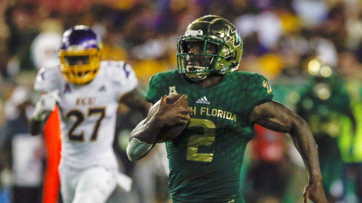 South Florida running back Jordan Cronkrite (2) runs the ball for an 80-yard touchdown run against East Carolina on Sept. 22 in Tampa.