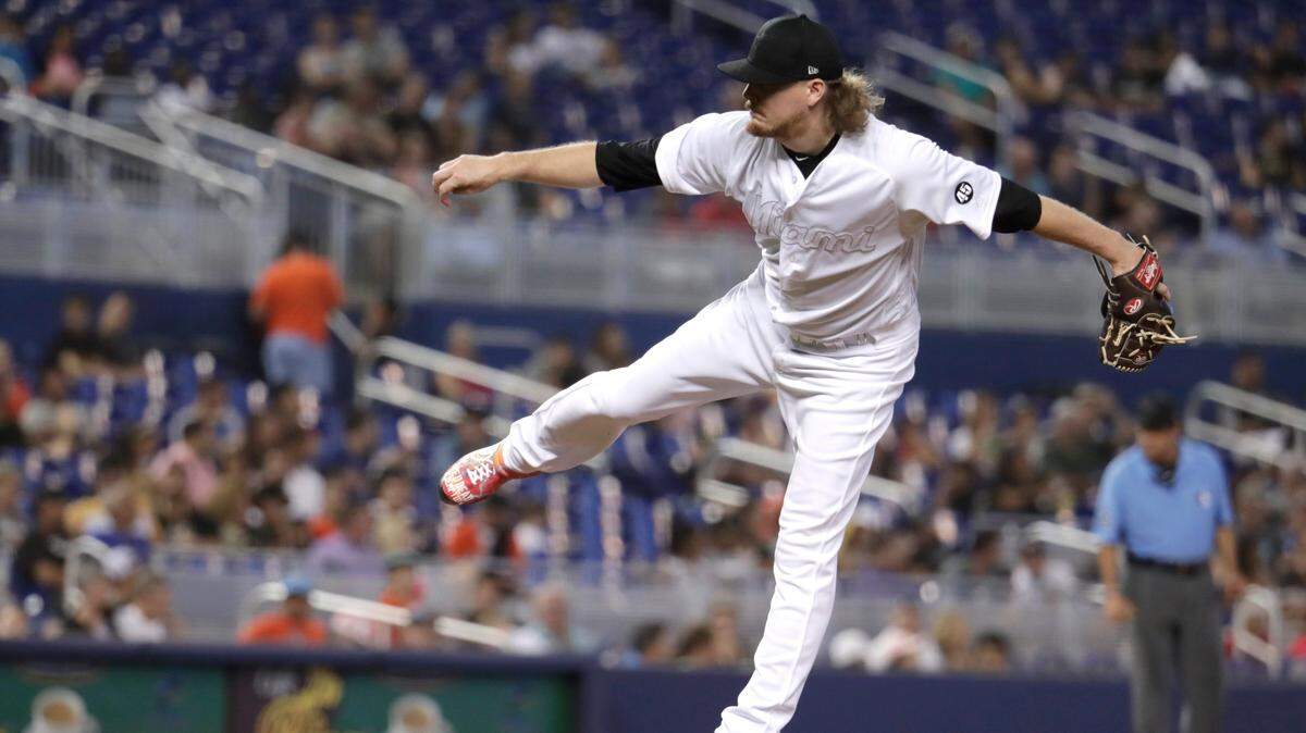 Miami Marlins relief pitcher Ryne Stanek throws during the ninth inning of a baseball game against the Philadelphia Phillies, Sunday, Aug. 25, 2019, in Miami. The Marlins won 3-2. (AP Photo/Lynne Sladky)