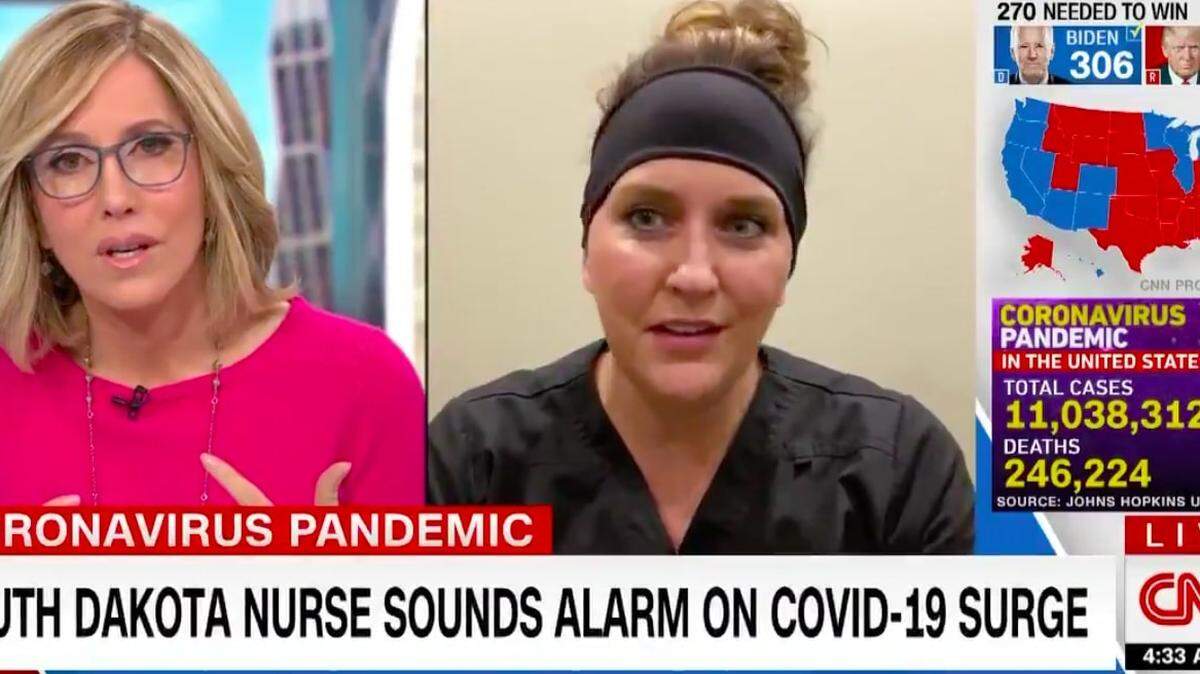 Emergency-room nurse Jodi Doering, right, is interviewed by CNN’s Alisyn Camerota after tweeting about her coronavirus patients.