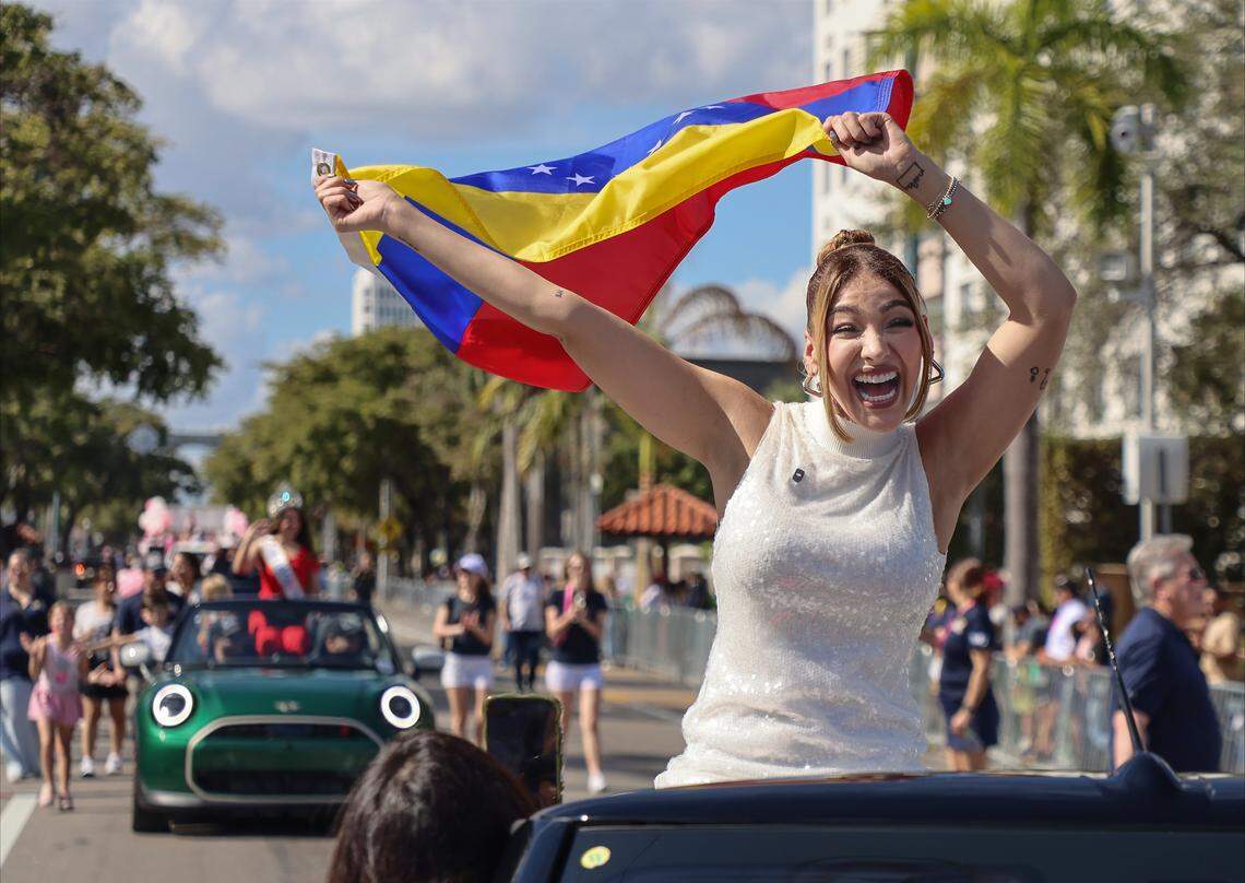 Grand Marshall Migbelis Castellano, a Univision TV personality, waves the Venezuelan flag as enthusiastically engages with the crowd. Miami's 50th Annual Three Kings Parade, also known as the "Desfile de los Reyes," a vibrant celebration that takes place honoring the Feast of the Epiphany, paraded on SW 8th Street from 17th to 27th Avenue, on Sunday, December 11, 2026, in Miami, Florida.