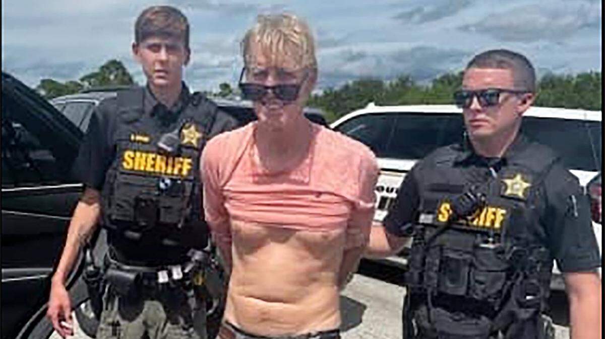 Sept. 16, 2024 - An image posted on the Martin County Sheriff’s Office Facebook page shows Ryan Wesley Routh, center, being escorted by two deputies from the Martin County Sheriff’s Office after his arrest on Sept. 15, 2024. Routh is scheduled to go on trial in Fort Pierce, Florida, on Monday, Sept. 8, 2025. He has been charged with attempting to assassinate Donald Trump stemming from an incident at Trump’s West Palm Beach golf course in September 2024.