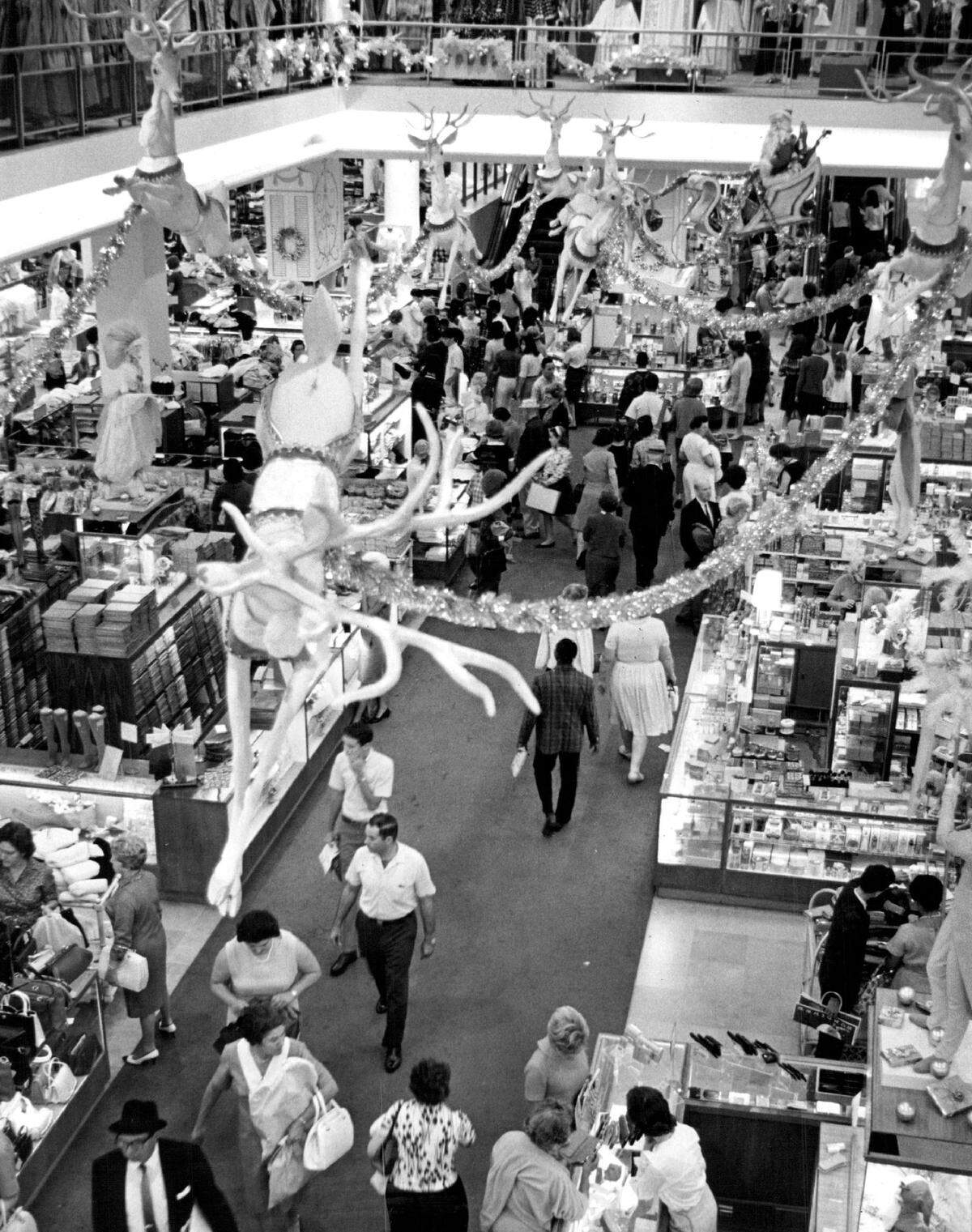 Reindeer over the holiday shoppers at Burdines in 1965.
