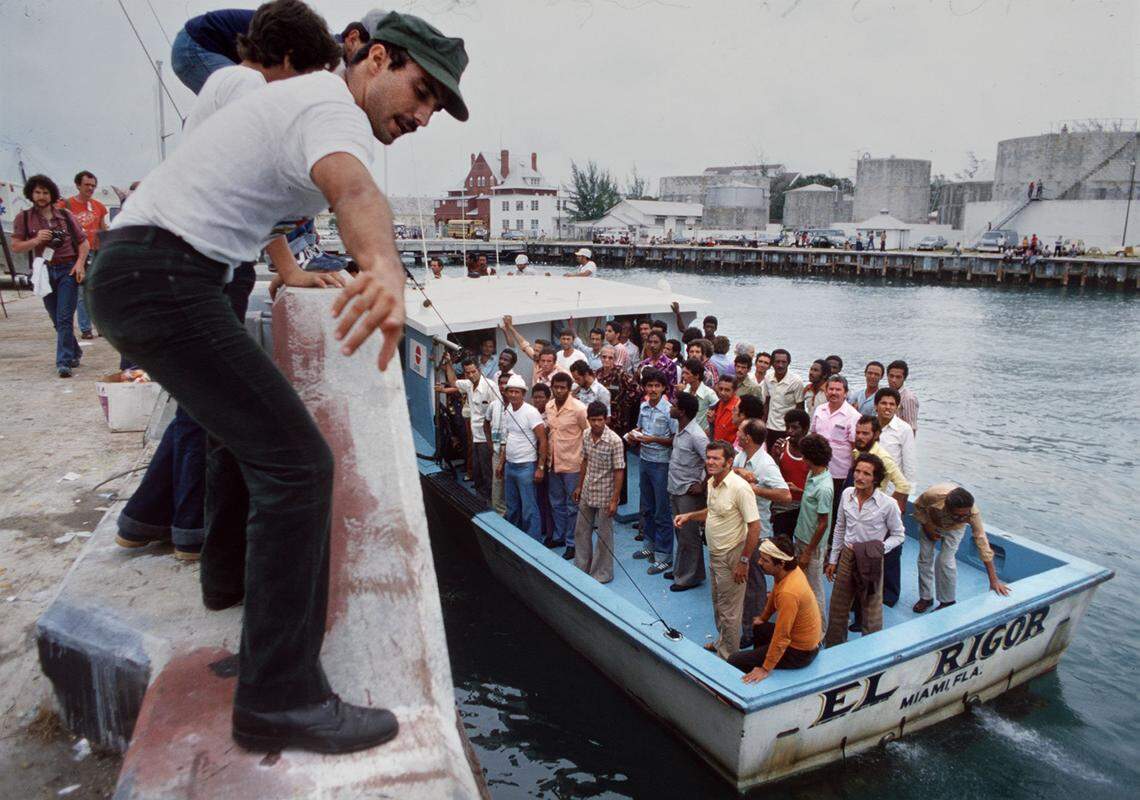 4/80 Photo by Tim Chapman/Miami Herald Staff -- Boat arrives in Key West with more Cuban refugees from Mariel Harbor after crossing the Florida Straits. More than 100, 000 Cubans came in the boatlift. 