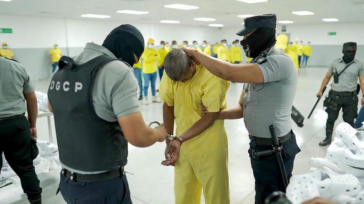 A screengrab from a video obtained from the El Salvador Presidential Press Office shows alleged members of the Venezuelan criminal organization Tren de Aragua, deported by the U.S. government, detained at the Terrorism Confinement Center in Tecoluca, El Salvador, on March 16, 2025.