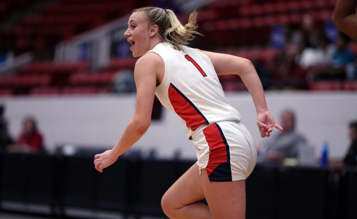 Westminster Academy guard Claire Erickson (1) reacts after sinking a three-pointer during the game against Florida State University School in a girls basketball Class 3A state semifinal at the RP Funding Center in Lakeland on Wednesday, February 23, 2022.