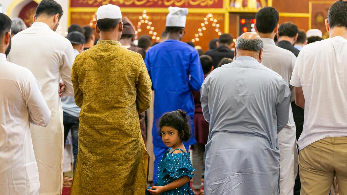 People perform the Eid al-Adha prayer at the Islamic Center of Greater Miami on Saturday, July 9, 2022, in Miami Gardens, Fla.