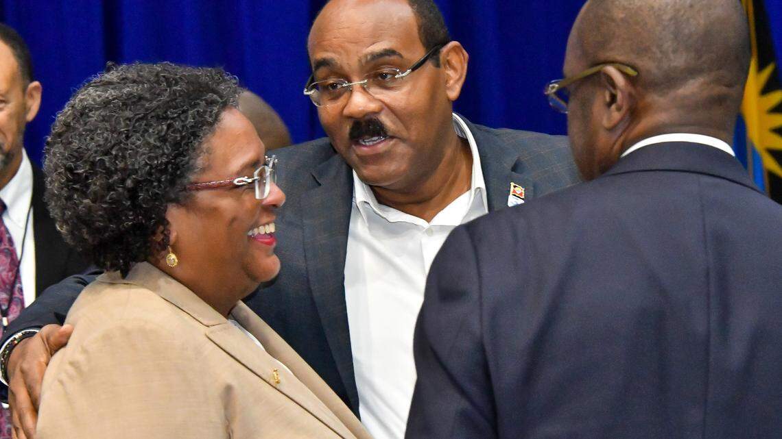 Antigua and Barbuda Prime Minister Gaston Browne chatting with Barbados Prime Minister Mia Mottley, left, during a visit in Guyana.