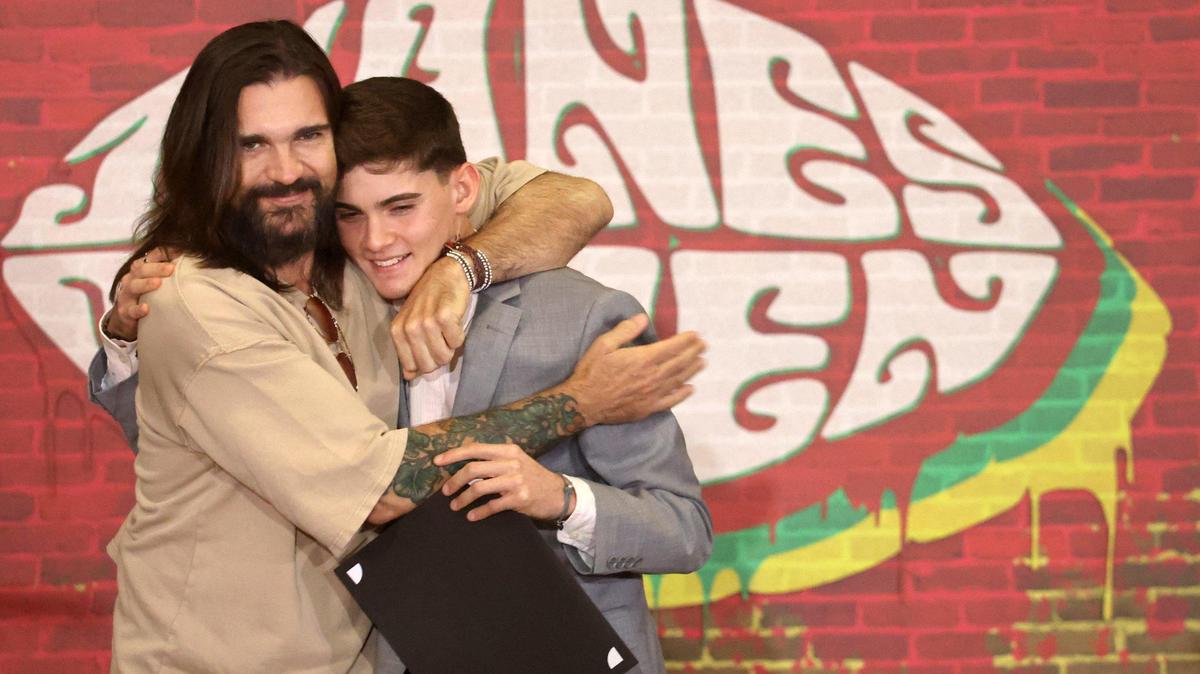 2019 Latin Recording Academy Person of the Year recording artist Juanes embraces the winner of Juanes Scholarship, Xavier Cintrón, on Tuesday, July 13, 2021. The Latin GRAMMY Cultural Foundation awarded the Juanes Scholarship to the 18-year-old Puerto Rican cuatro student during a special presentation in Miami.  