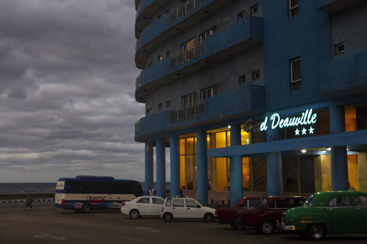 A restored neon sign at Havana’s Hotel Deauville sits on Galiano just off the Malecon. Kadir Lopez Nieves, a Cuban artist, has been restoring old neon signs around the city.