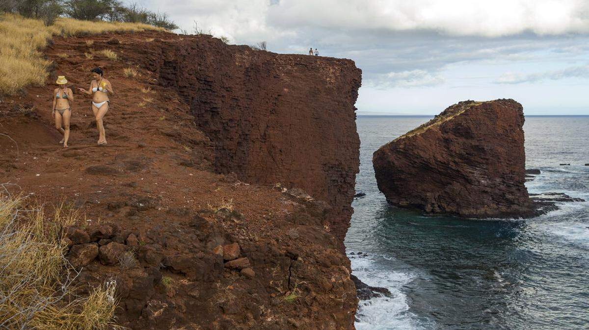Pu’u Pehe, or Sweetheart Rock, an imposing boulder in the sea.
