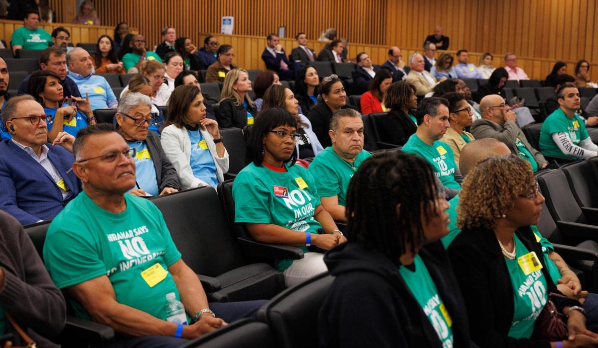 About 30 people wearing “Miramar Says NO to Incinerator” T-shirts attend a January Miami-Dade commission meeting discussing trash at the Stephen P. Clark Government Center in Miami. 