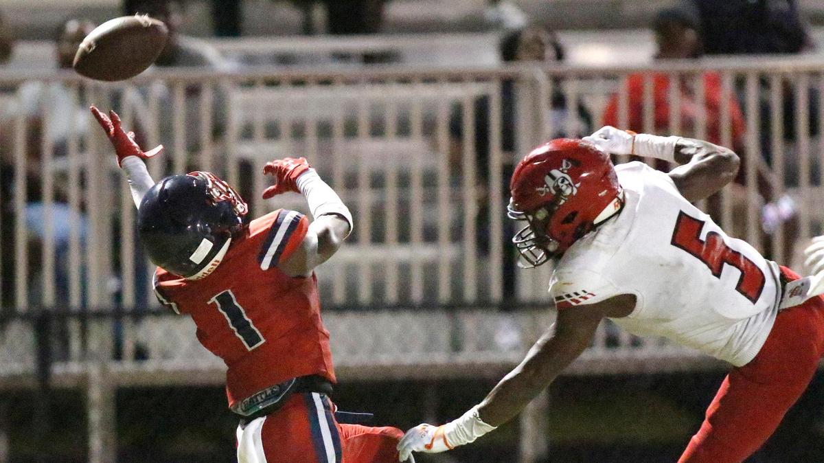 Miramar’s defensive back Tre’ Rigby (1) attempts to intercept a pass intended for Edison’s Nathaniel Ray Joseph (5) during football game on Friday, August 19, 2022 at Miramar High School in Miramar. Andrew Uloza / for Miami Herald