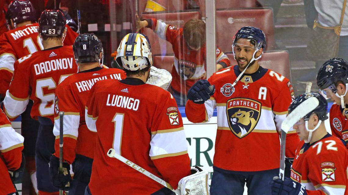 Florida Panthers goalie Roberto Luongo (1) and center Vincent Trocheck (21) celebrate their 3-1 win over the Toronto Maple Leafs during an NHL regular season hockey game at the BB&T Center on Friday, January 18, 2018 in Sunrise.