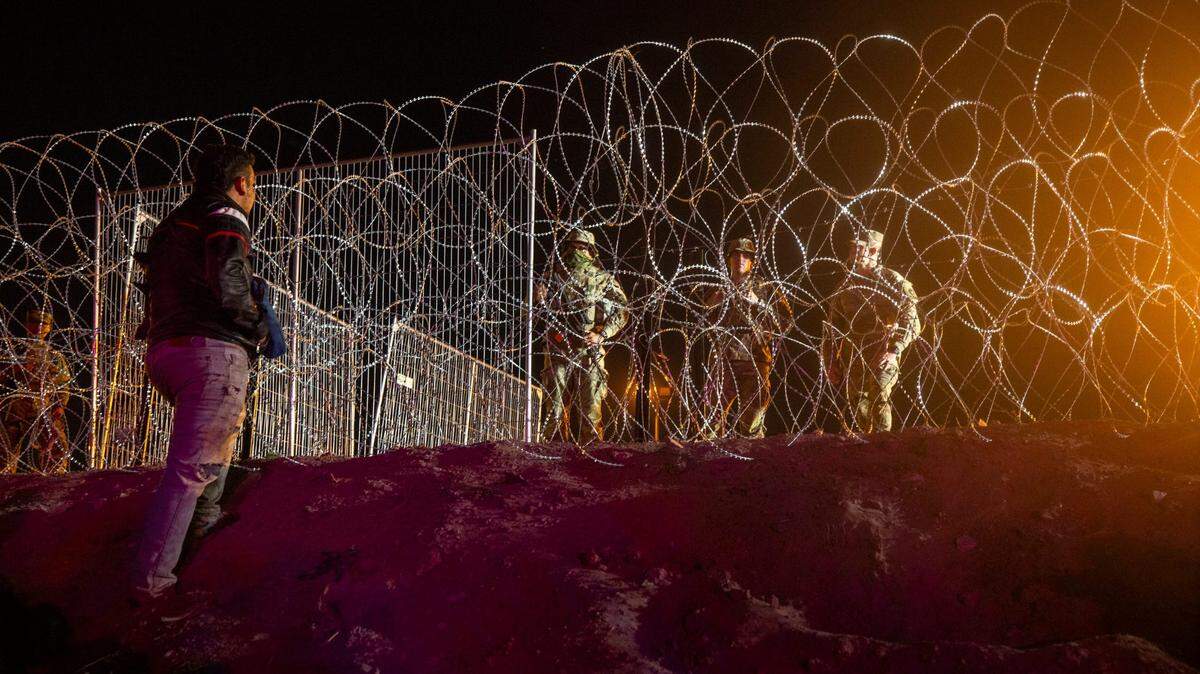 Immigrants seeking asylum in the United States are stuck in a makeshift camp between border walls between the United States and Mexico.