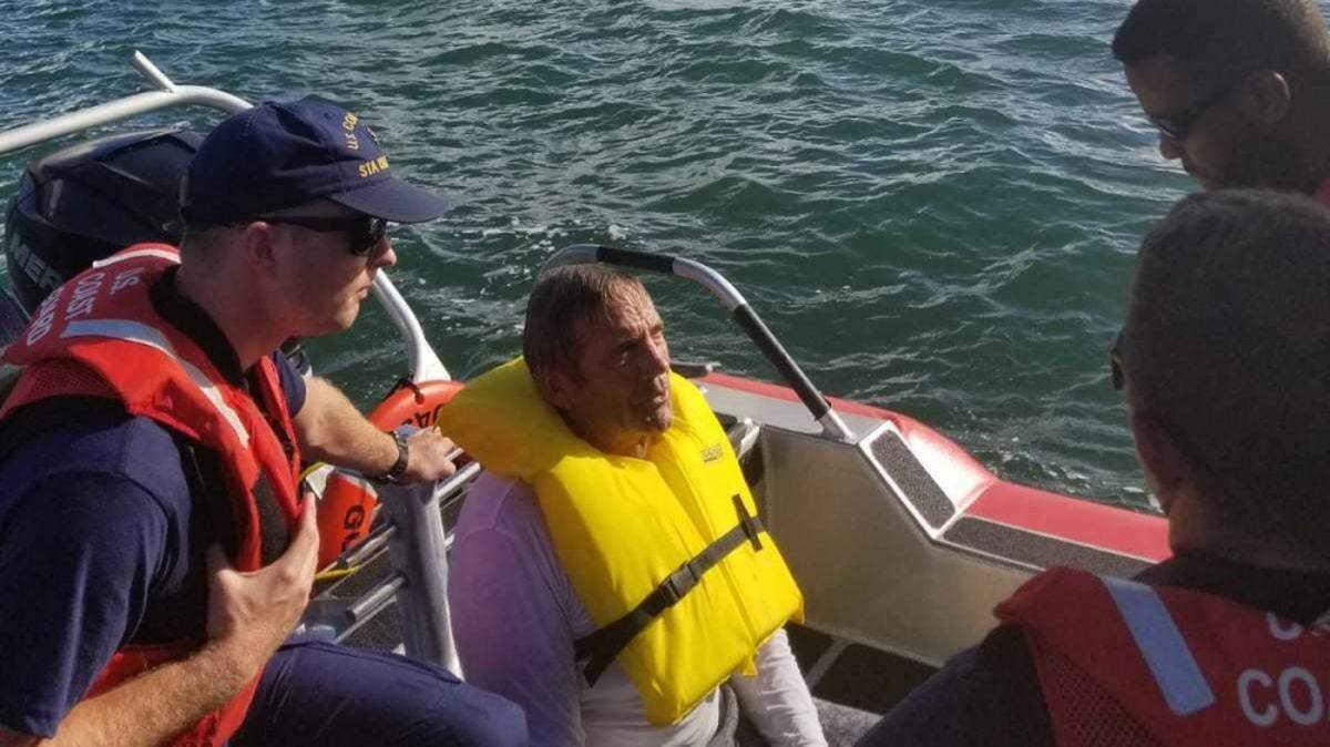 Robert Vonnegut sits aboard a Coast Guard Station Islamorada 33-foot Special Purpose Craft-Law Enforcement boat after being rescued by the crew members Aug. 27, 2018, near Tavernier. The boat crew and a Coast Guard Air Station Miami MH-65 helicopter crew went searching for Vonnegut after watchstanders at Coast Guard Sector Key West received a report from the son of Vonnegut stating his father departed from Sunrise Drive and hadn’t returned since he left his home late Sunday night.