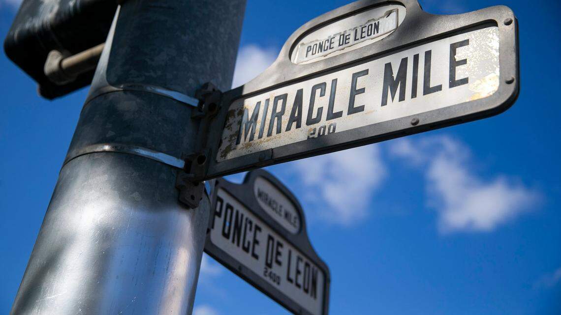 A view of the Miracle Mile and Ponce de Leon street sign located in Coral Gables, Florida on Friday, December 10, 2021.