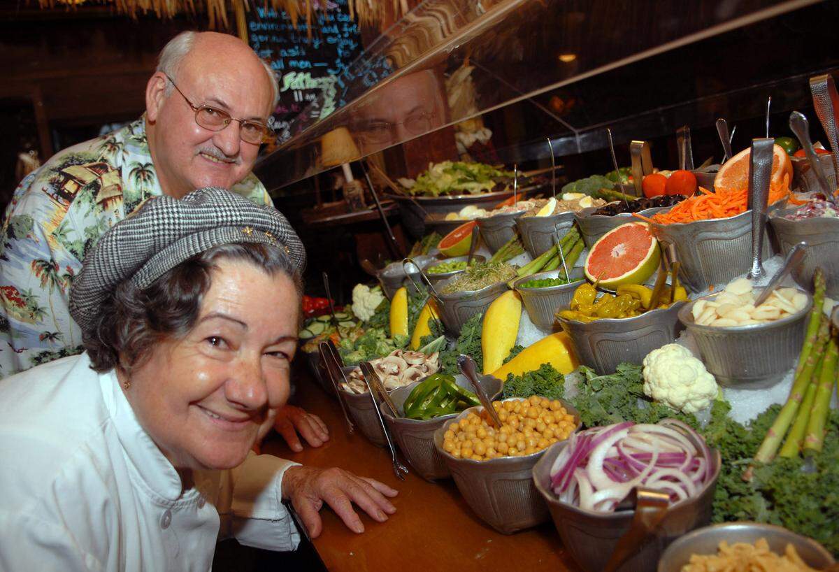 Jim Kleinricert is one of the owners of the Ark, in Davie. Here he is with head chef Maria Florindo. at he salad bar