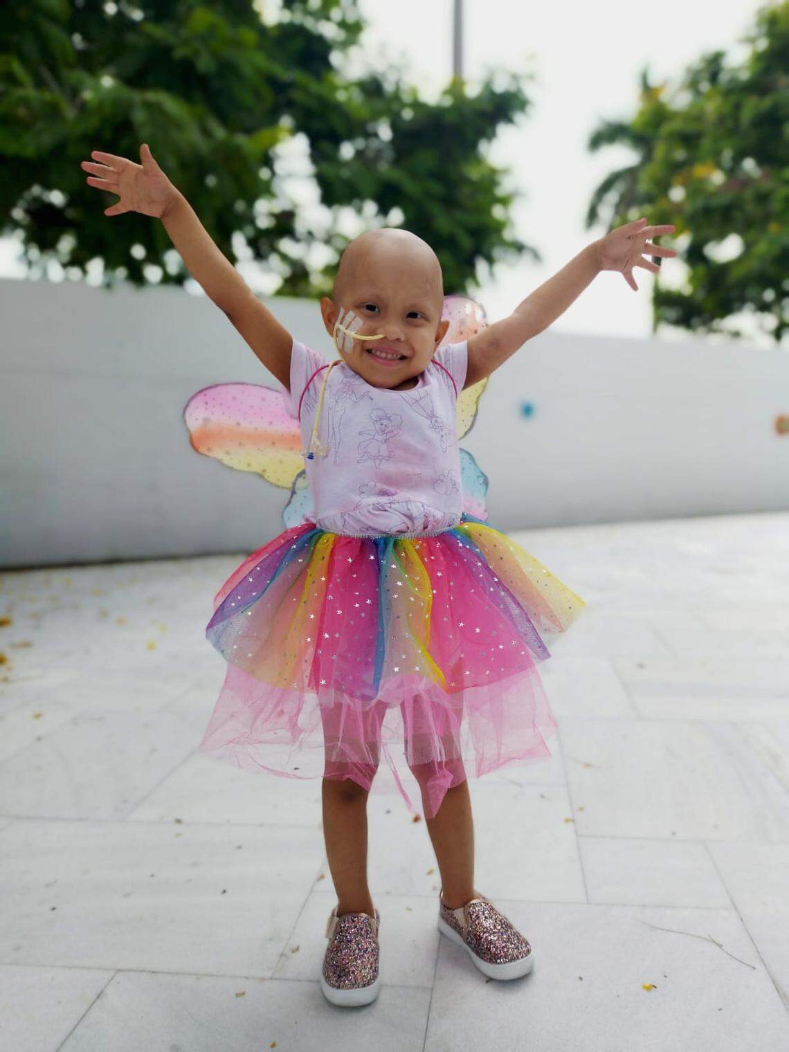 Salma in a fairy costume after she had surgery for brain cancer.