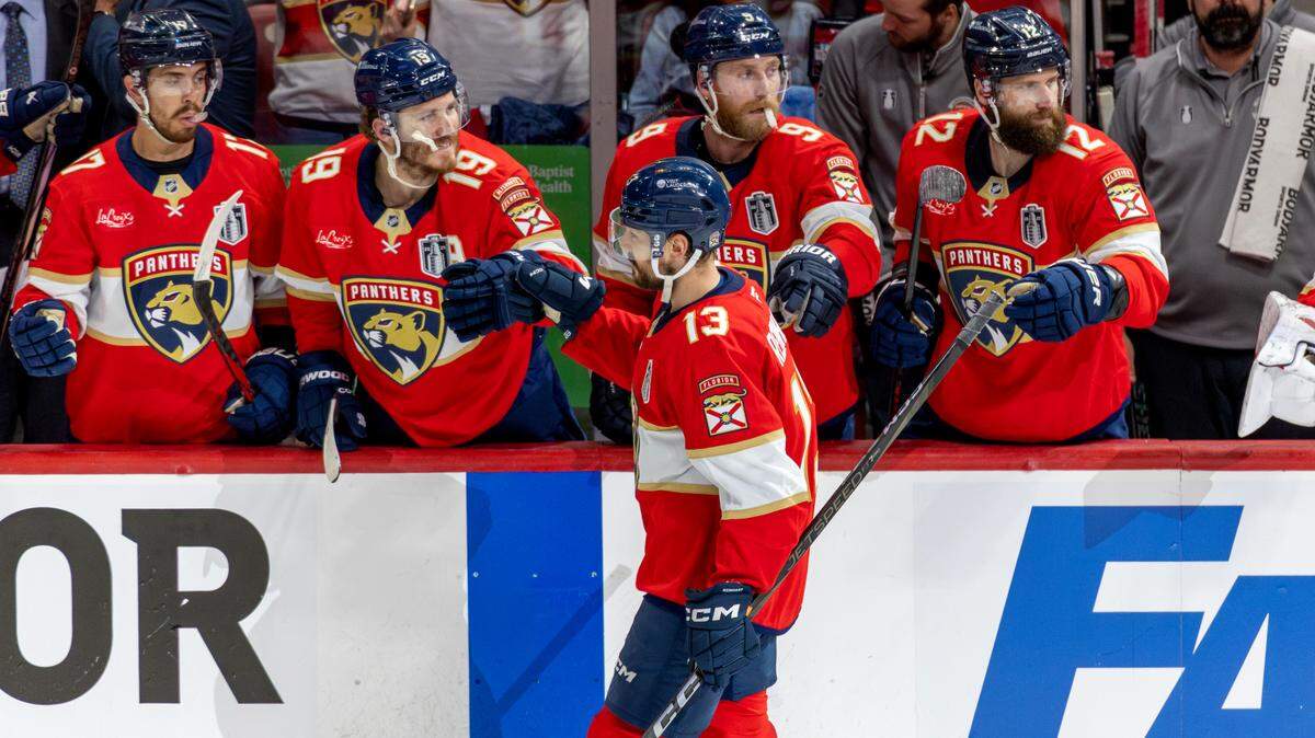 Florida Panthers center Sam Reinhart (13) celebrates with teammates at the bench after scoring during the second period against the Edmonton Oilers in Game 3 of the Stanley Cup Final at Amerant Bank Arena on Monday, June 9, 2025, in Sunrise, Fla.