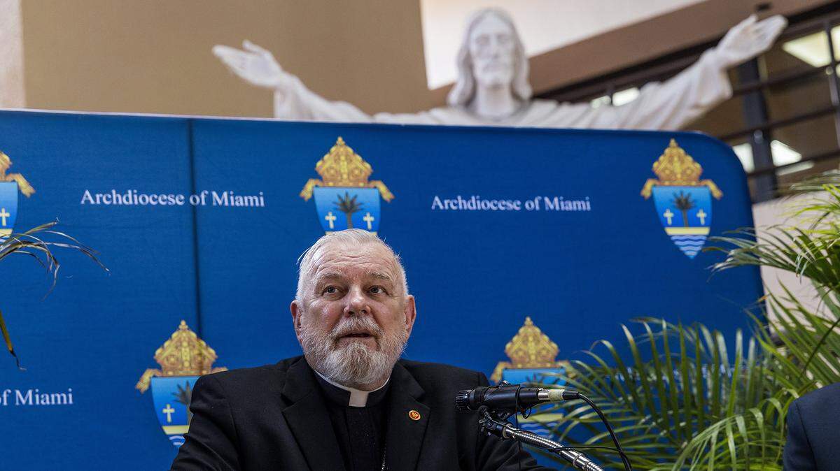 Archbishop Thomas Wenski speaks during a press conference held by the Archdiocese of Miami to address the abrupt cancellation of an $11 million federal contract with Catholic Charities and the immediate and long-term impact on services for unaccompanied minors and the broader humanitarian mission of the Archdiocese. The contract supported shelter and care for unaccompanied migrant children entering the United States. Wenski spoke in Miami Shores on Thursday, April 16, 2026.