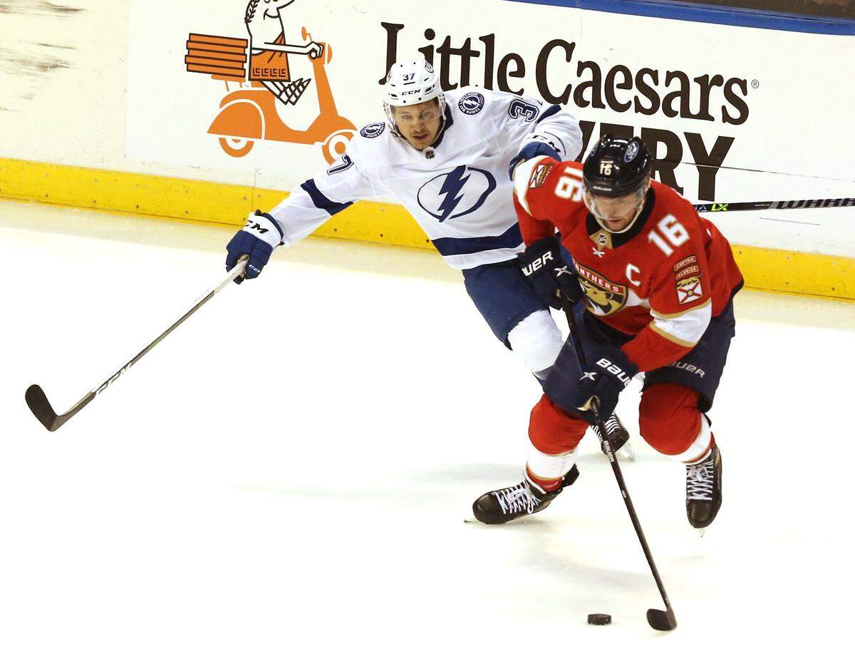 Florida Panthers Aleksander Barkov (16) and Tampa Bay Lighting Yanni Gourde (37) during the third period of game 5 of the first round NHL Stanley Cup playoff series at the BB&T Center on Tuesday, May 24, 2021 in Sunrise, Florida.