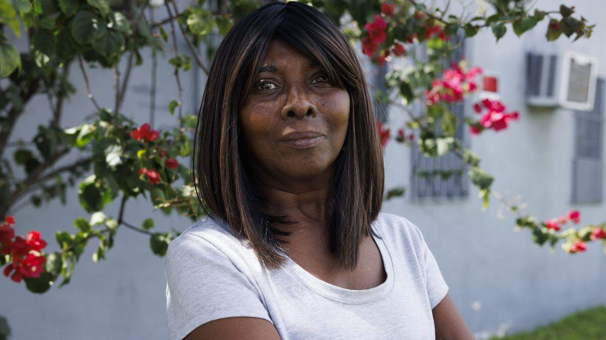 Shirley Phinzee, a local nighttime janitor, poses after an interview on Monday, Sept. 15, 2025 outside her church, Harvest Center International, in Liberty City, Miami, Fla. Phinzee used to take care of a pastor for her old church for a reduced rent, but after he passed, she became homeless. Phinzee needs her car since she works until 1 A.M. and has found bus transportation to be unreliable. ÒBetween car payment and insurance and storage, canÕt save up enough to afford my own place,Ó said Phinzee. Prior to working for the pastor, Phinzee also had a history of having violence against her by people she would rent rooms from. ÒAt least with my car, no one can do that to me because this is mine,Ó said Phinzee.