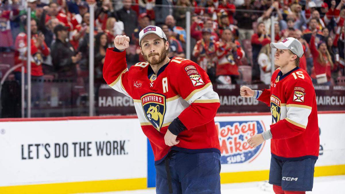 Florida Panthers left wing Matthew Tkachuk (19) reacts as he makes his way to the trophy presentation after defeating the New York Rangers in Game 6 of the Eastern Conference finals of the NHL hockey Stanley Cup playoffs at the Amerant Bank Arena on Saturday, June 1, 2024, in Sunrise, Fla.