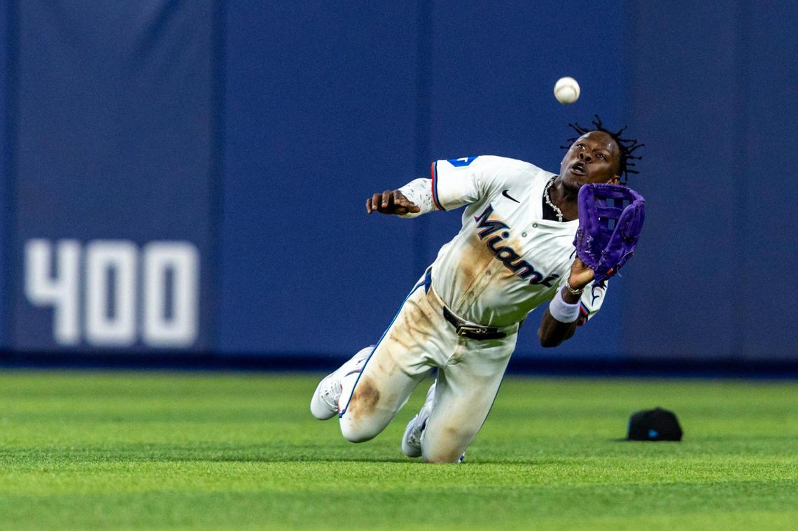 Miami Marlins center fielder Jazz Chisholm Jr. (2) makes a catch in the outfield for an out during the seventh inning of an MLB game on opening day against the Pittsburgh Pirates at LoanDepot Park in Miami, Florida, on Thursday, March 28, 2024.