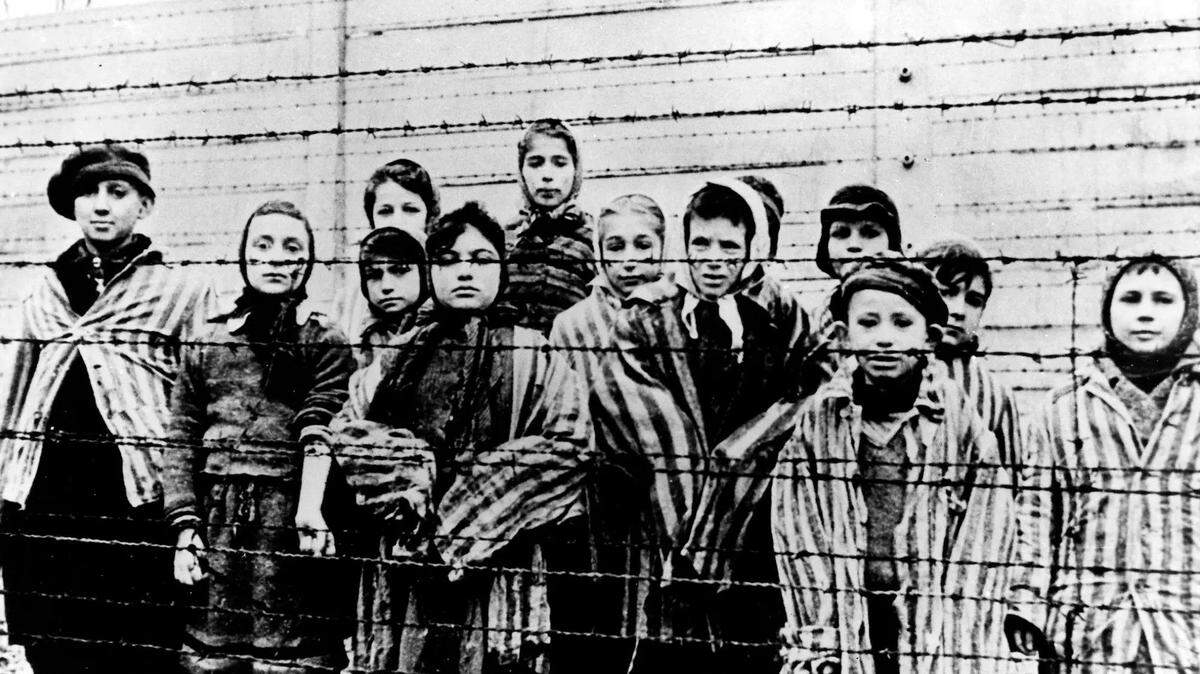 Children at the Auschwitz concentration camp in German-occupied Poland after it was liberated by the Soviet Army in 1945.
