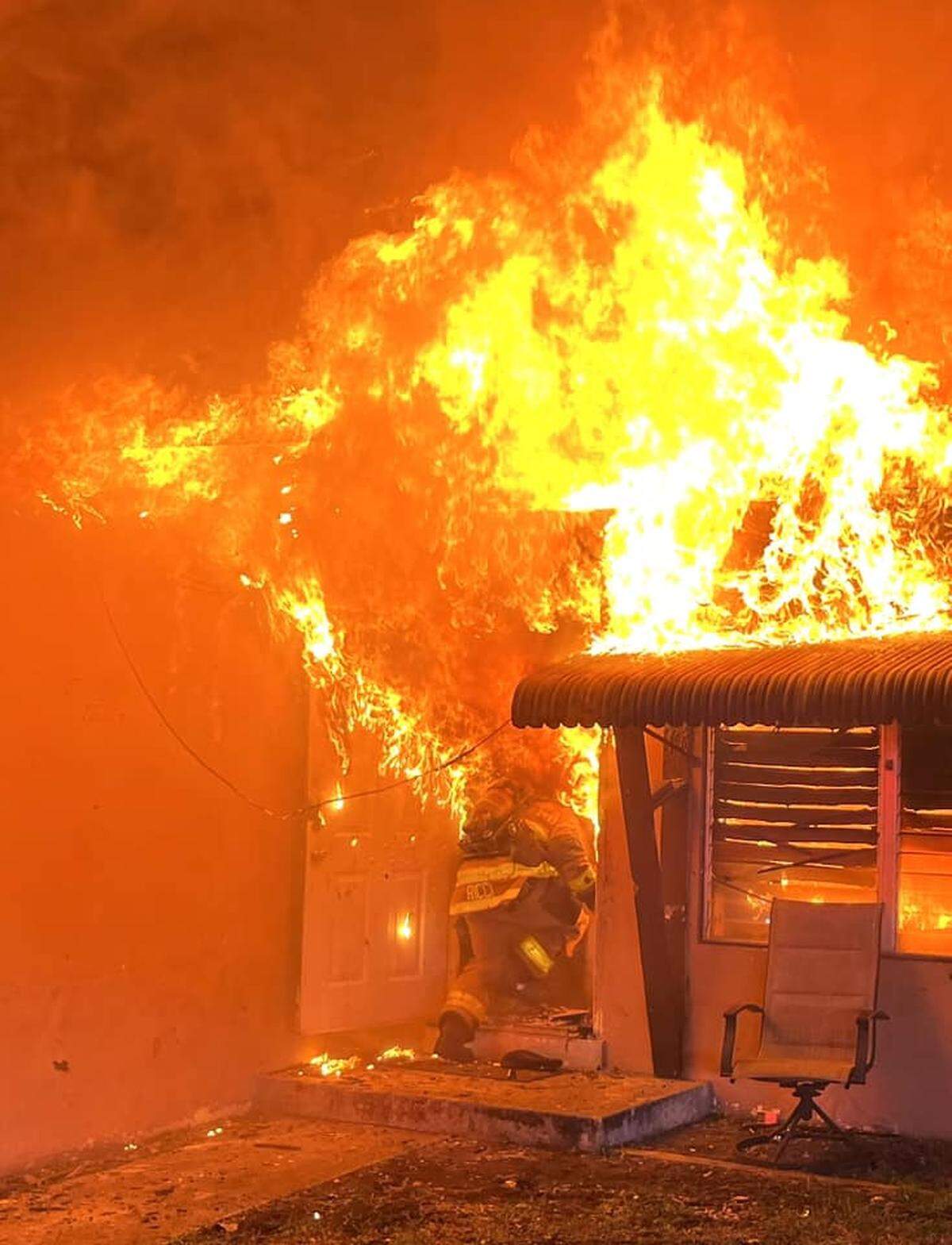 A Fort Lauderdale Fire Rescue captain raced into a burning home without the protection of a hose line in the 1200 block of Northwest 15th Street after 3 a.m. May 13, 2023. According to fire rescue, the captain saw a wheelchair just inside the front door but could not tell if someone was in it. No one was and the seven residents inside the burning home got out.