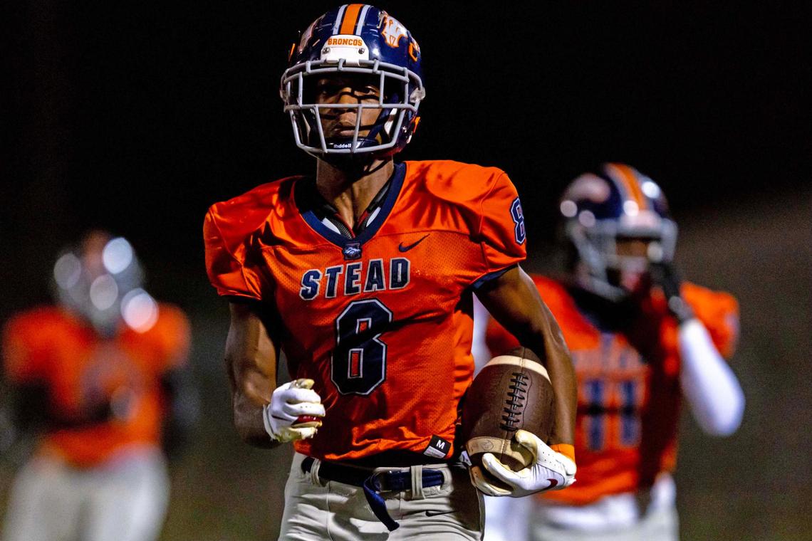 Homestead athlete David Jester (8) runs the ball for a touchdown on the opening kick-return during the first half of a high school football game against Miramar at Harris Field Park in Homestead, Florida, on Friday, November 25, 2022.