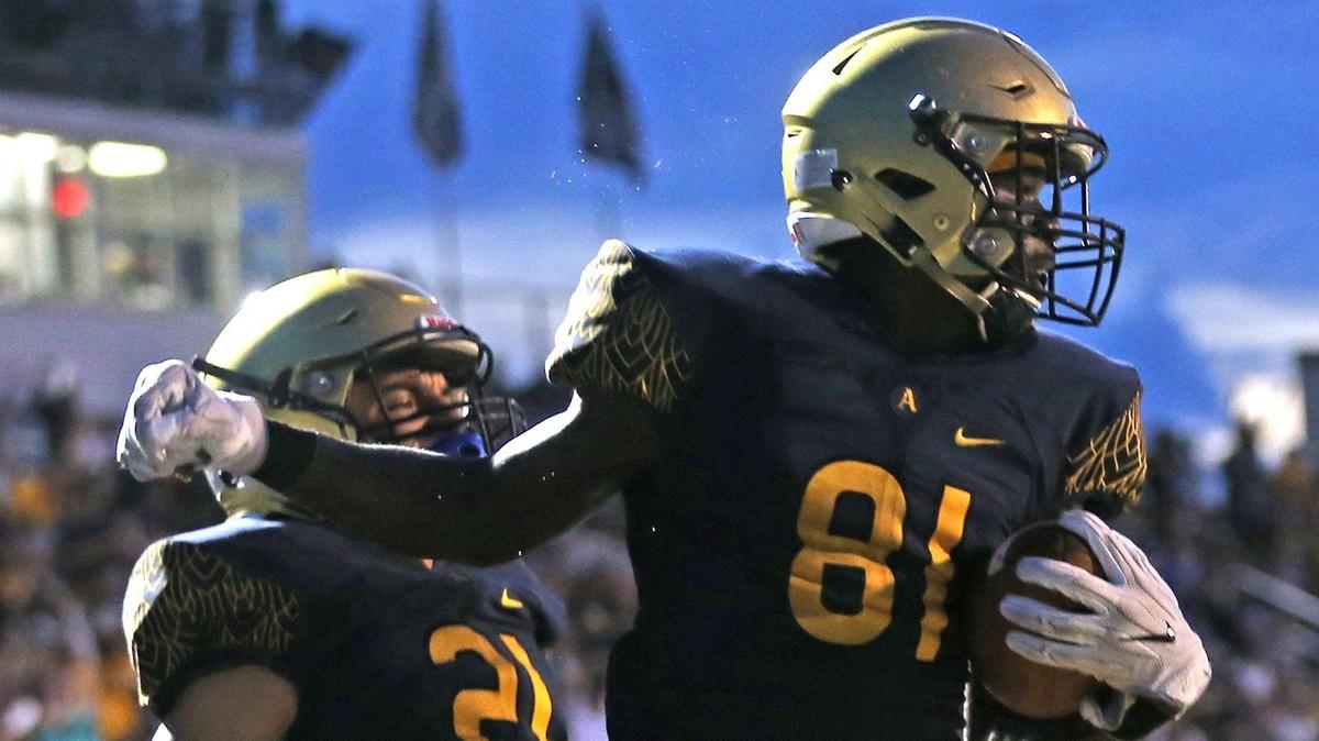 St Thomas Aquinas Marcus Rosemy (81) celebrates his first quarter touchdown with Xavier Restrepo (21) as they play Miami Central at St Thomas Aquinas HS in Fort Lauderdale, Fl, Friday, September, 21, 2018.