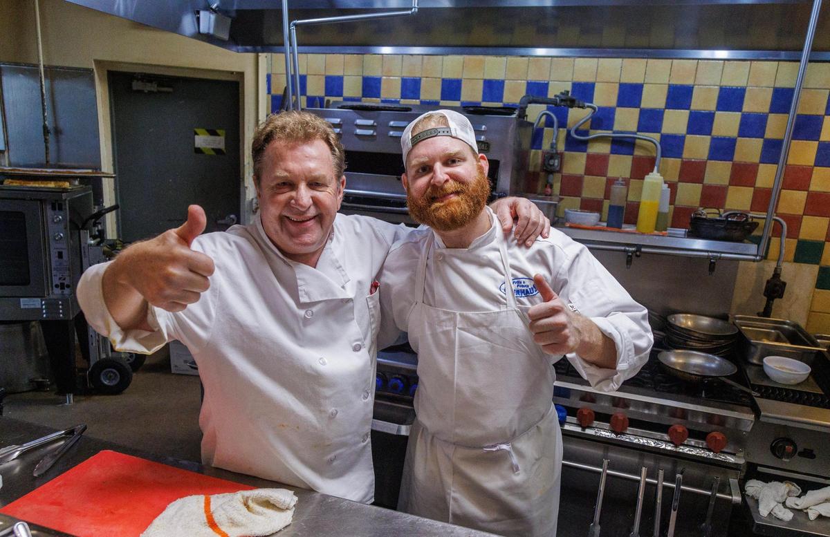 Fritz & Franz Bierhaus owners Harald Neuweg (left) and his son James Neuweg posed in the kitchen of the restaurant.