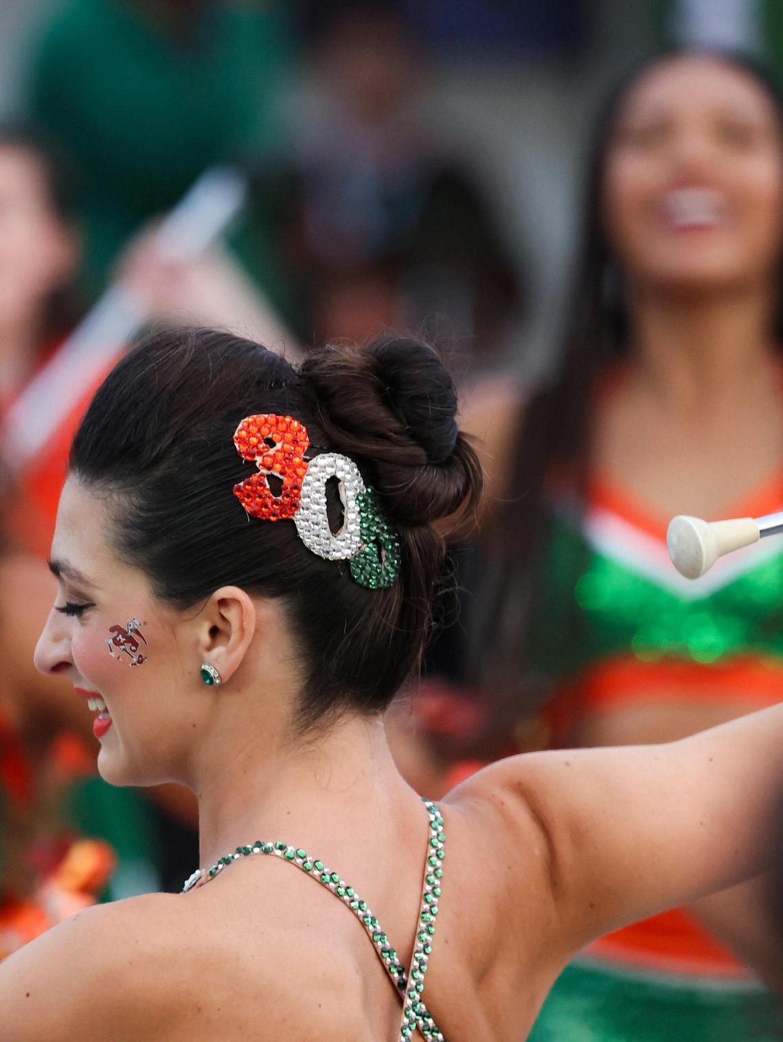 Mikenzie Juskalian, the featured twirler, performs during the University of Miami Centennial celebration on Tuesday, April 8, 2025, outside on the Lakeside Patio at the University of Miami’s Coral Gables campus.